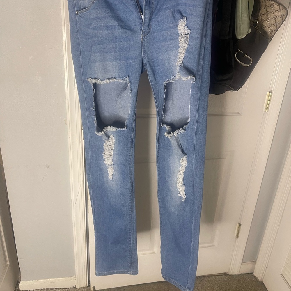 Women's Distressed Blue Jeans